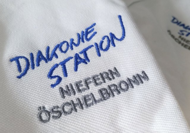 Stickerei<br>auf Poloshirt